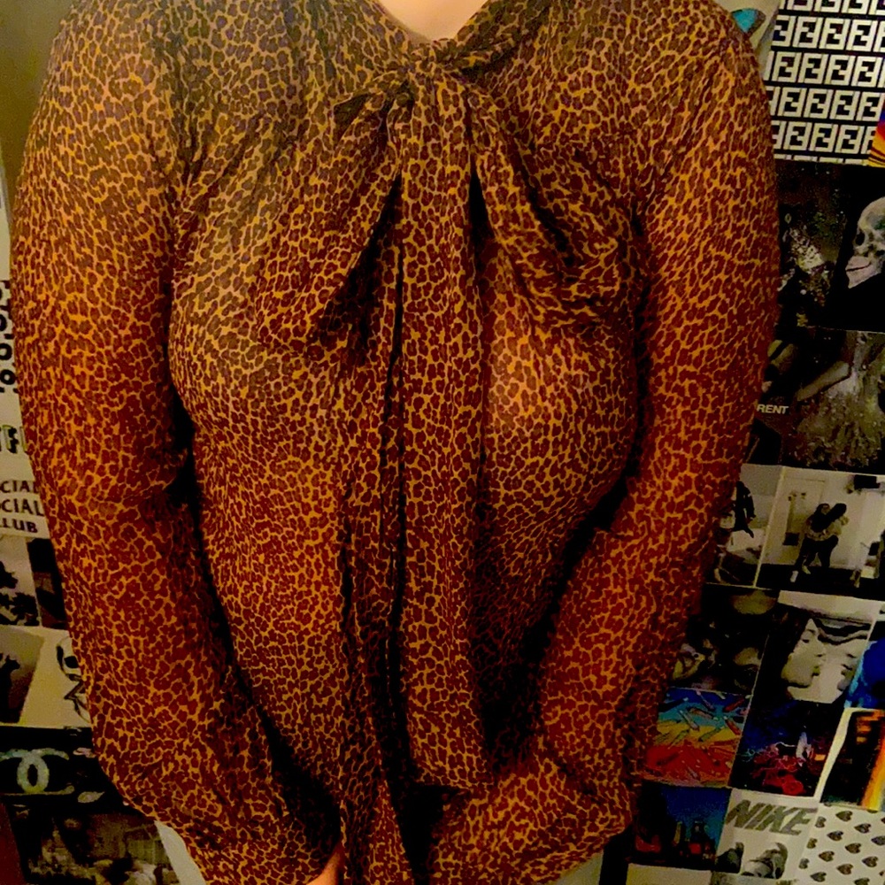 This is a Michael Kors leopard blouse